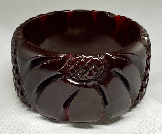 B276 wide black cherry pineapple & flower carved bakelite bangle